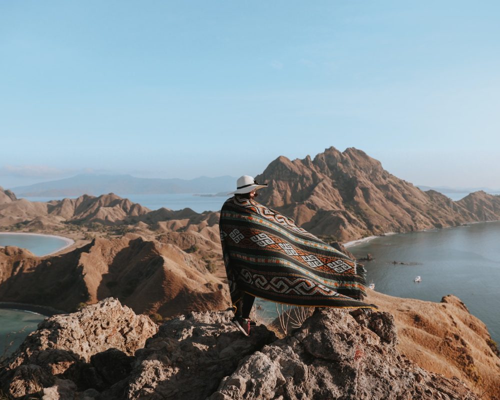 girl-with-ethnic-clothes-on-top-hill.jpg